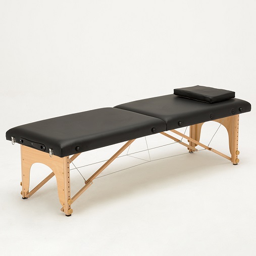 portable-folding-massage-table-black-wood-frame-studio.jpg