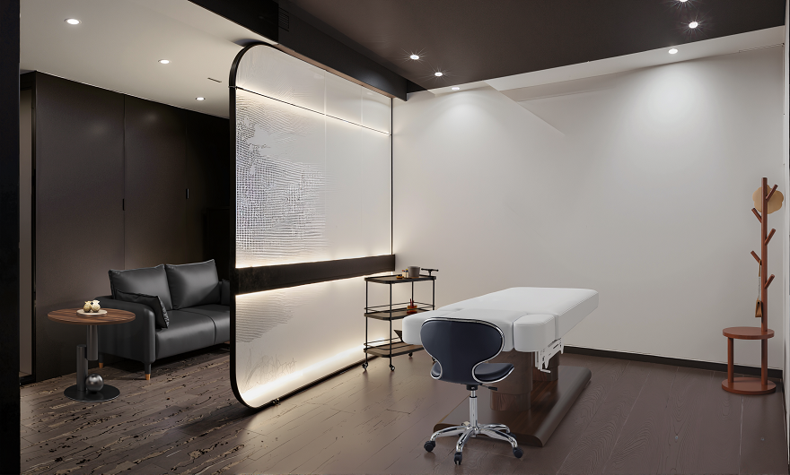 Head spa therapy room with soft lighting and curved furniture layout by Dongpin Design. dongpin-head-spa-room-relaxation-space.png